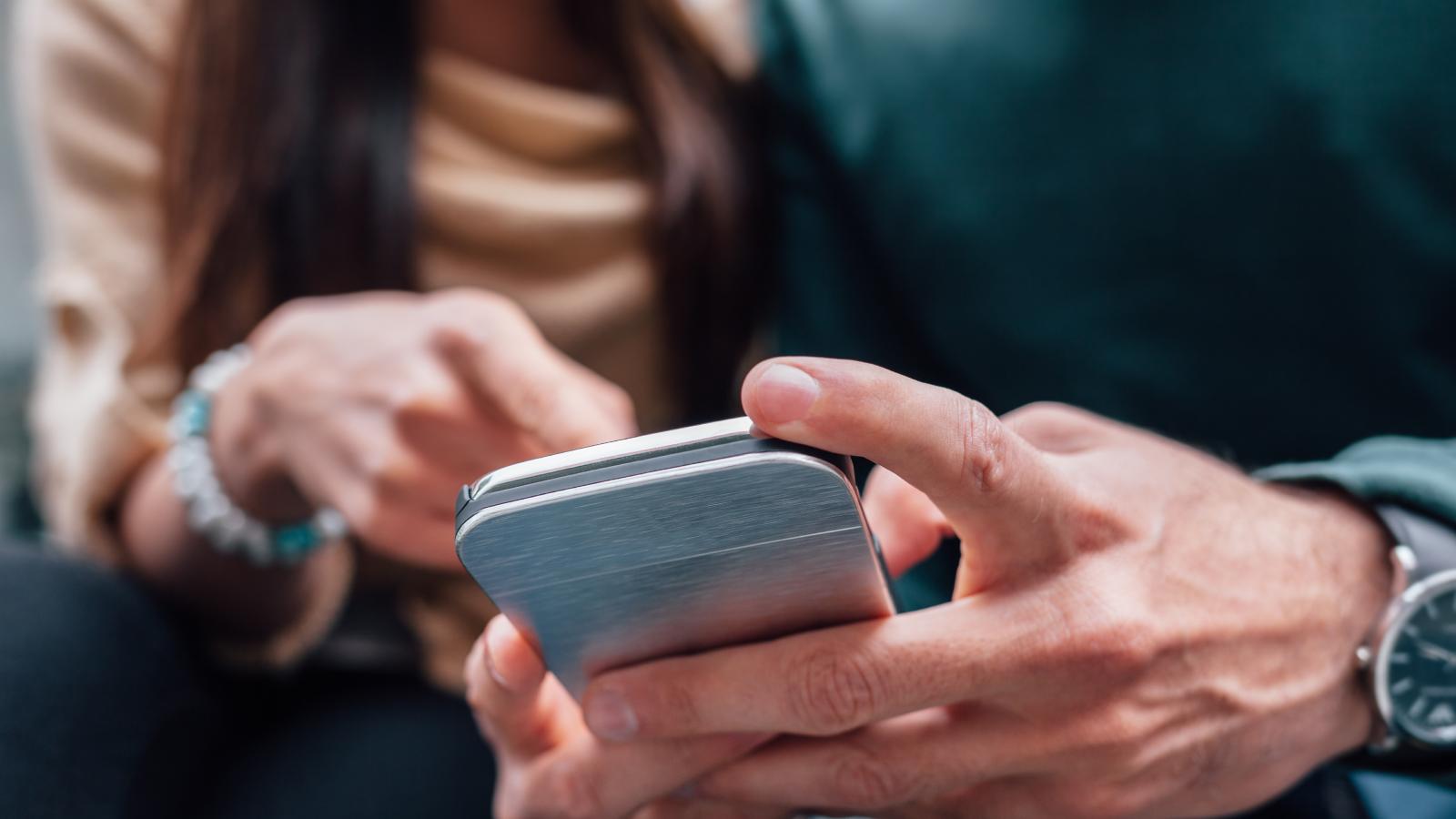 Person holding smartphone