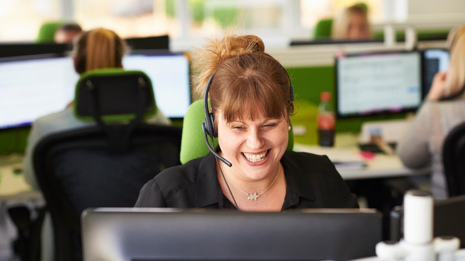 Woman taking call in call center