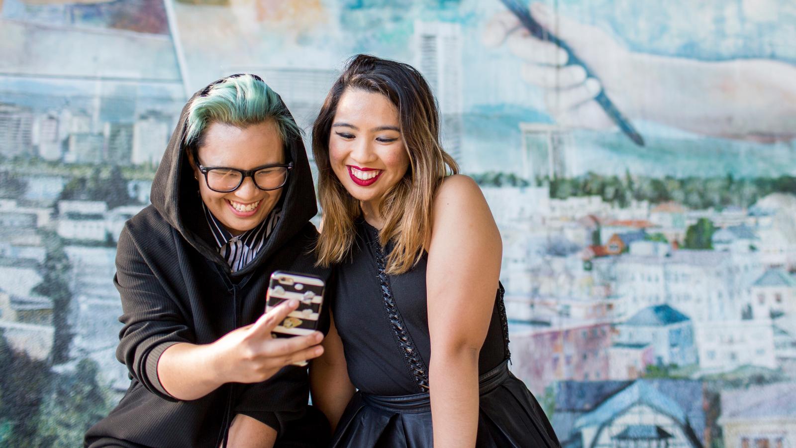 A woman and her mom taking a selfie