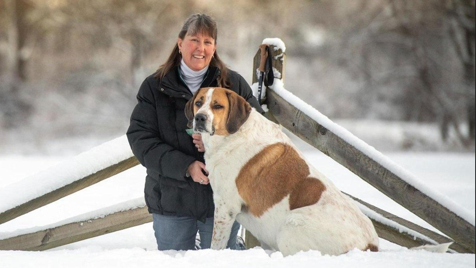 Woman standing with her dog