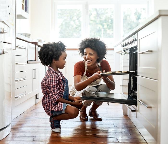 Woman and son in the kitchen.