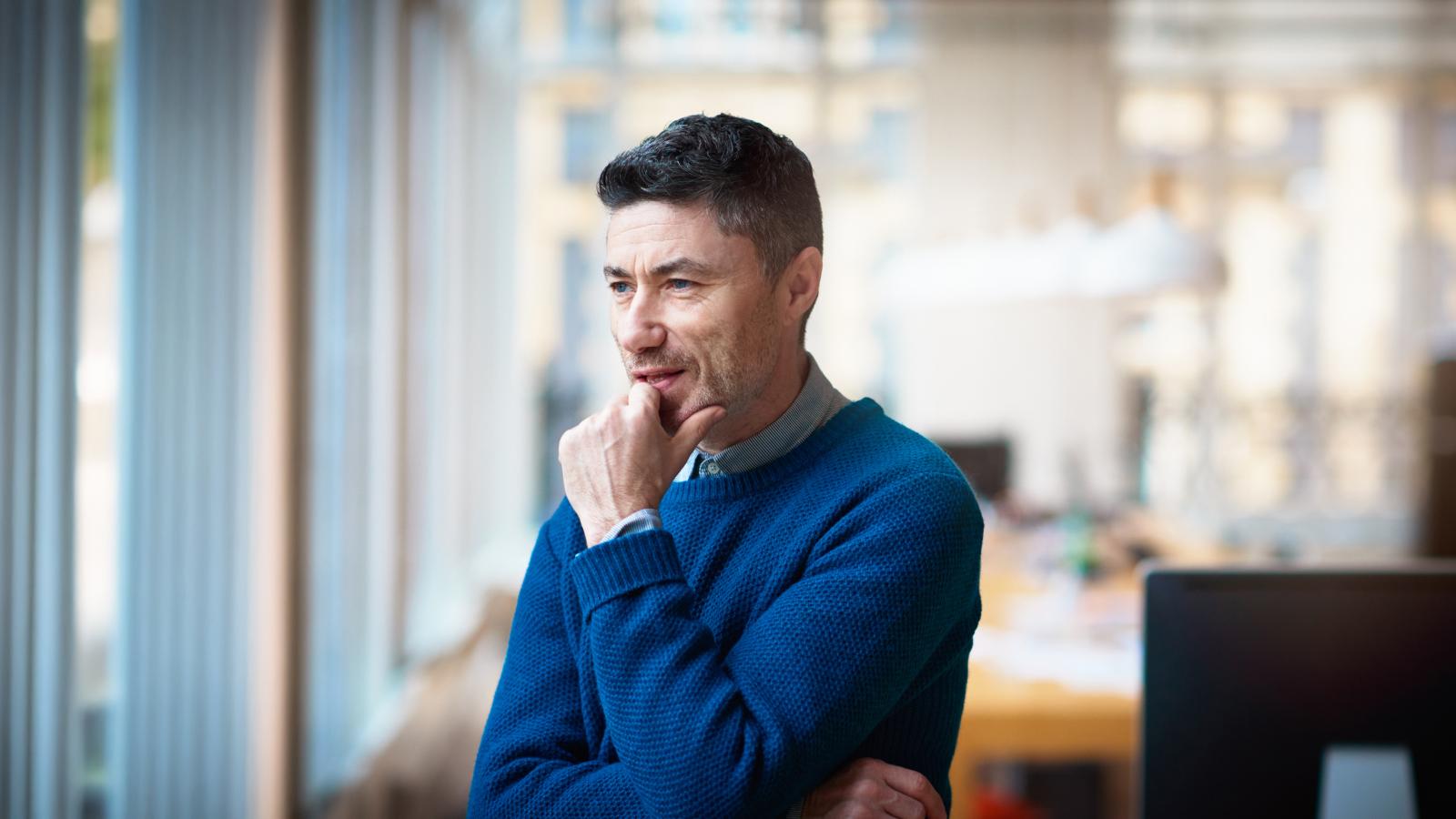 Businessman standing in modern office