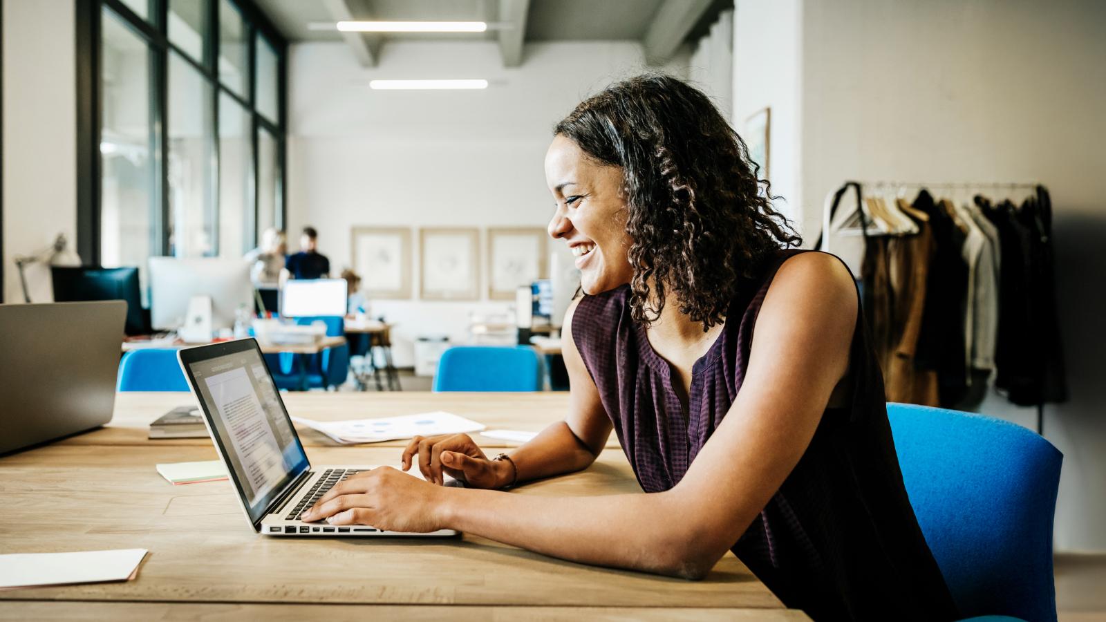 Businesswoman working on laptop