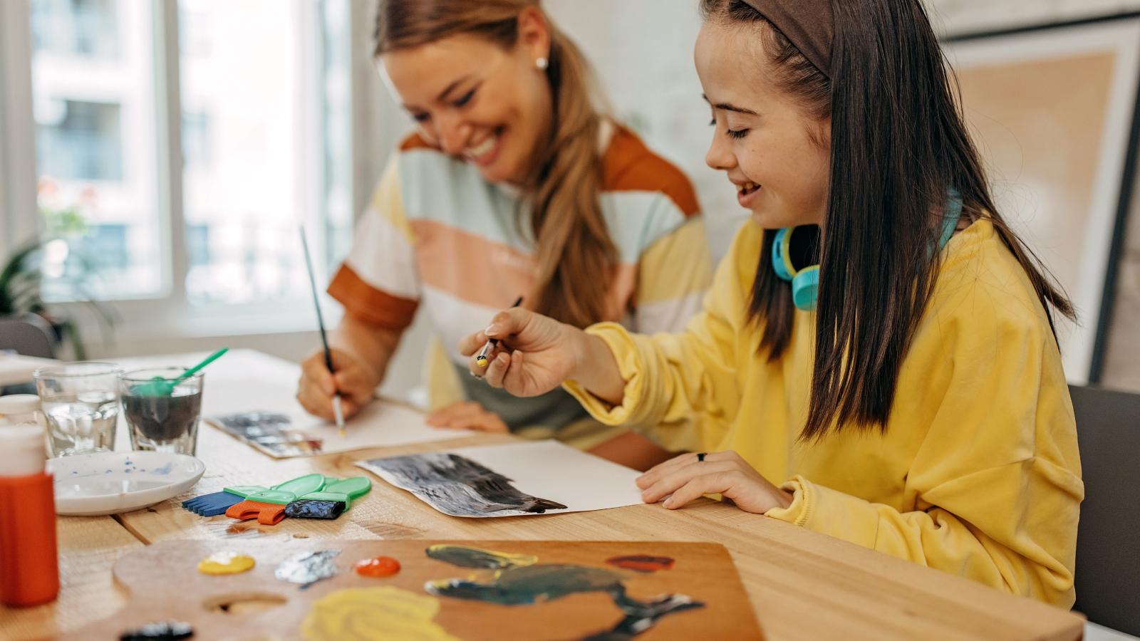 Mother and daughter painting