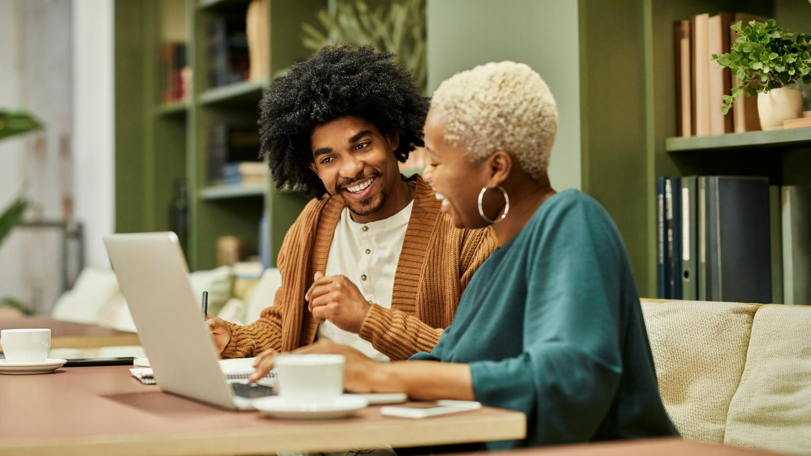 Coworkers discussing in office