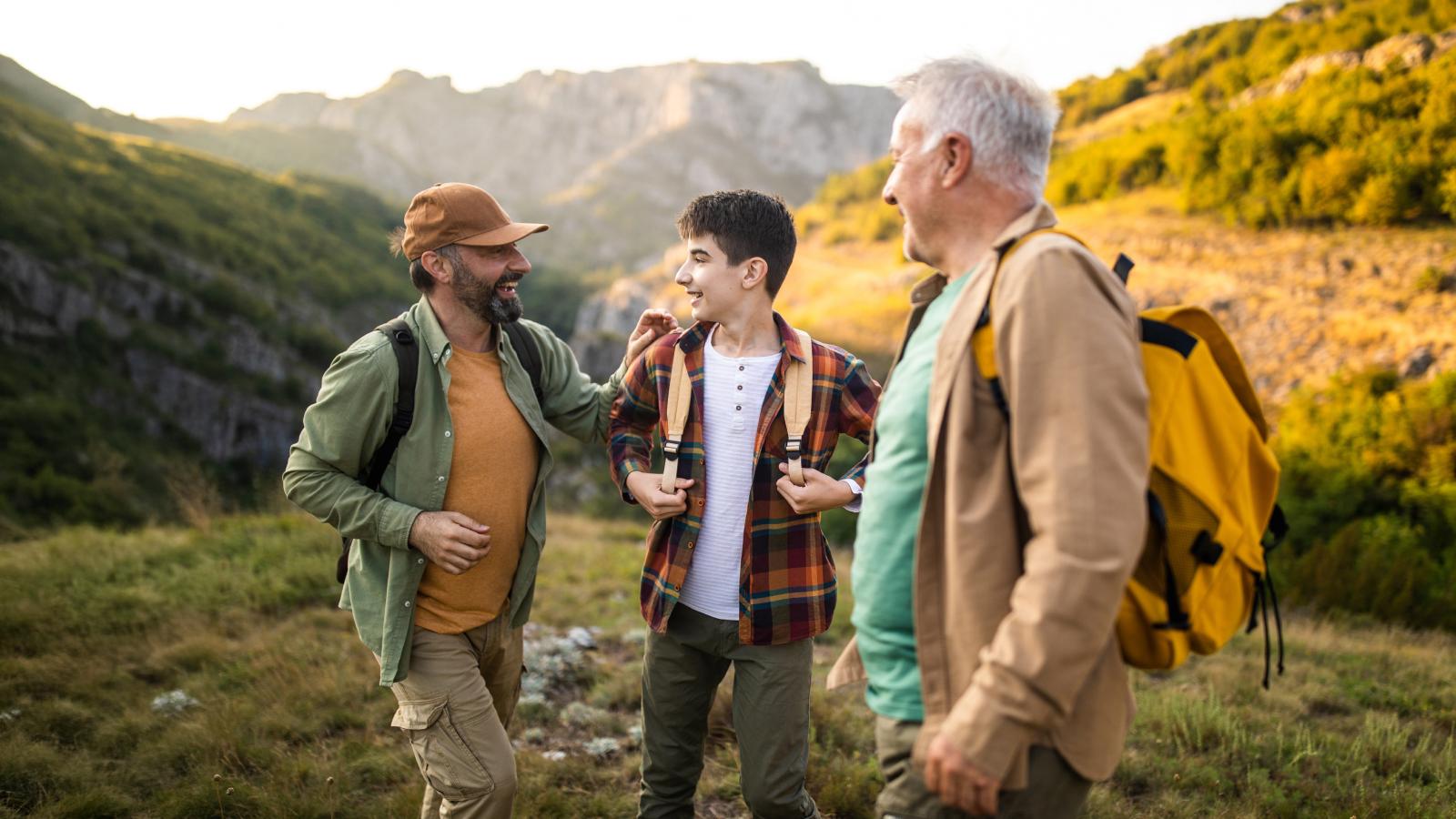 multi-generation-family-boding-while-hiking