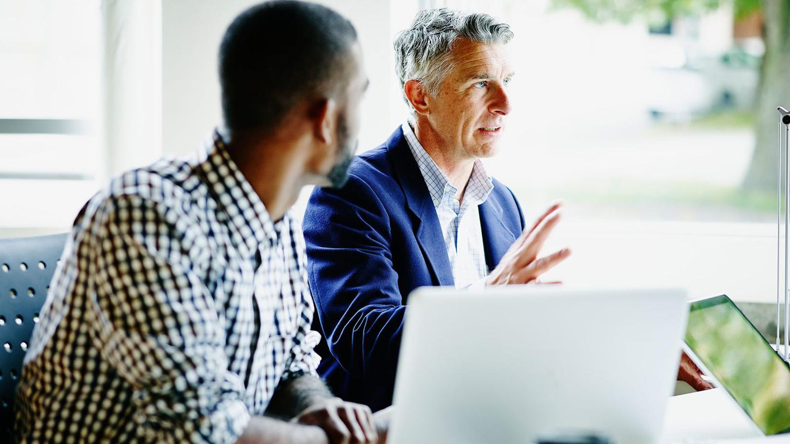 Financial representative meeting with his clients