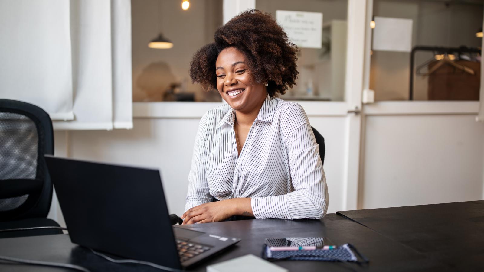 Woman working from an office.