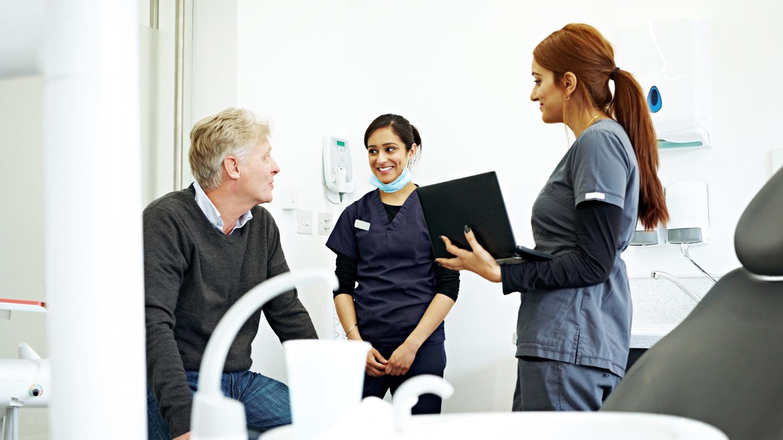 Patient consulting doctor