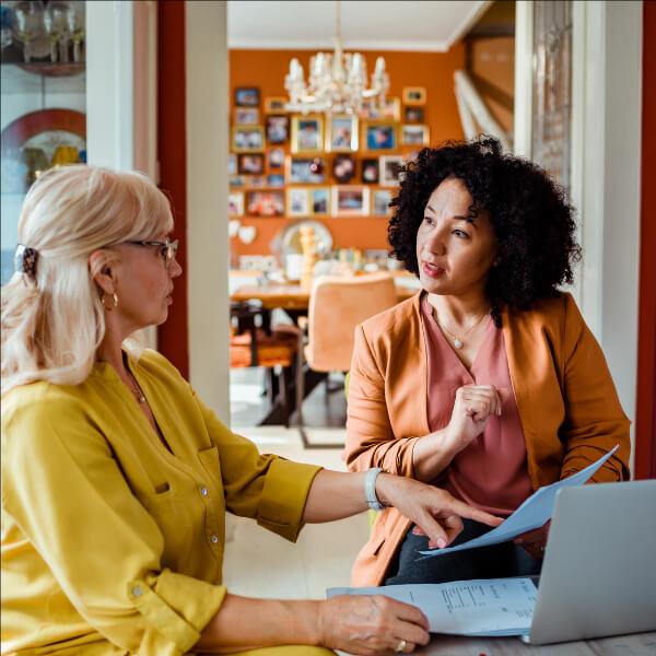 Two women in a discussion.