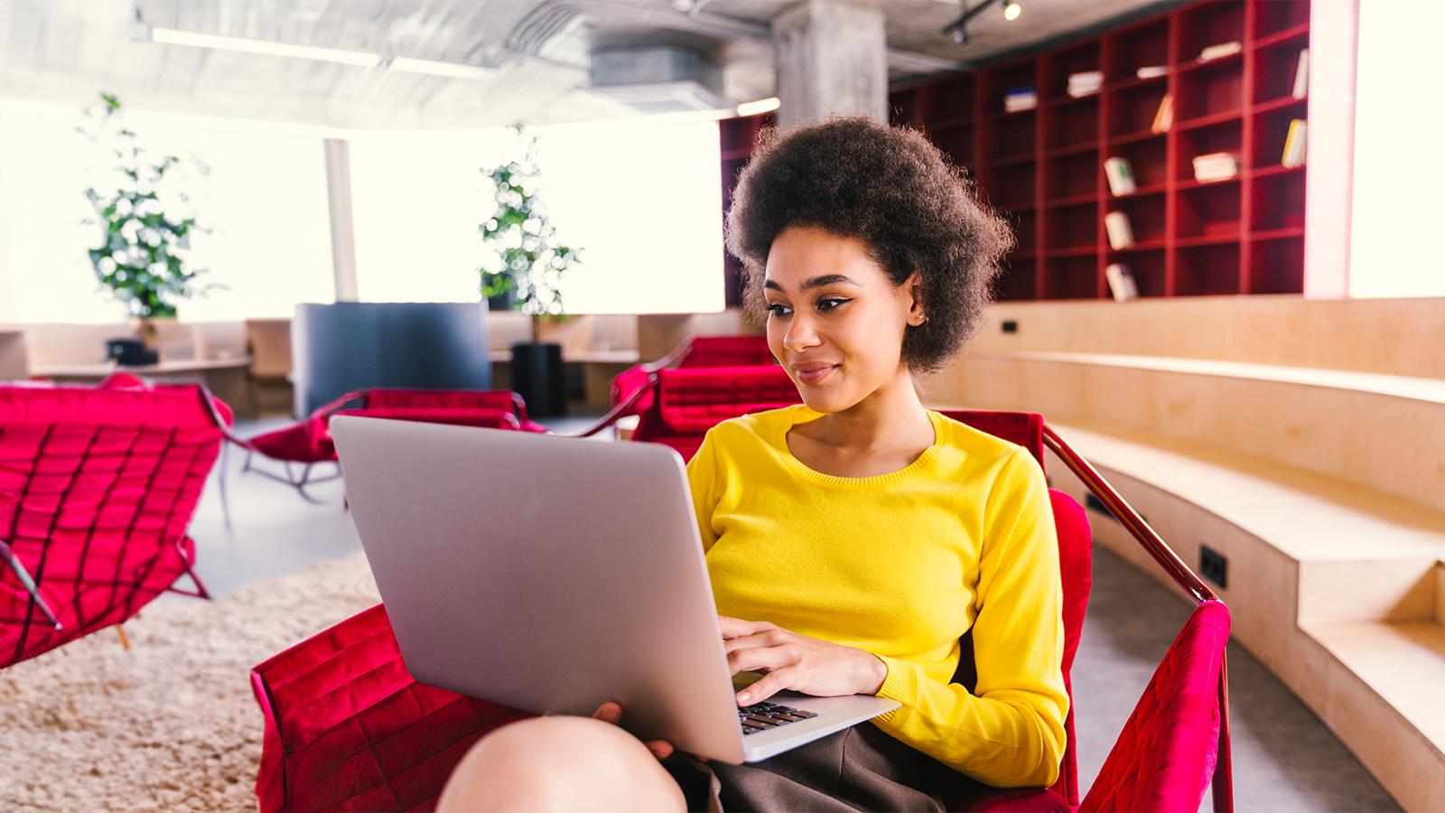 Young woman working on her laptop Young woman working on her laptop