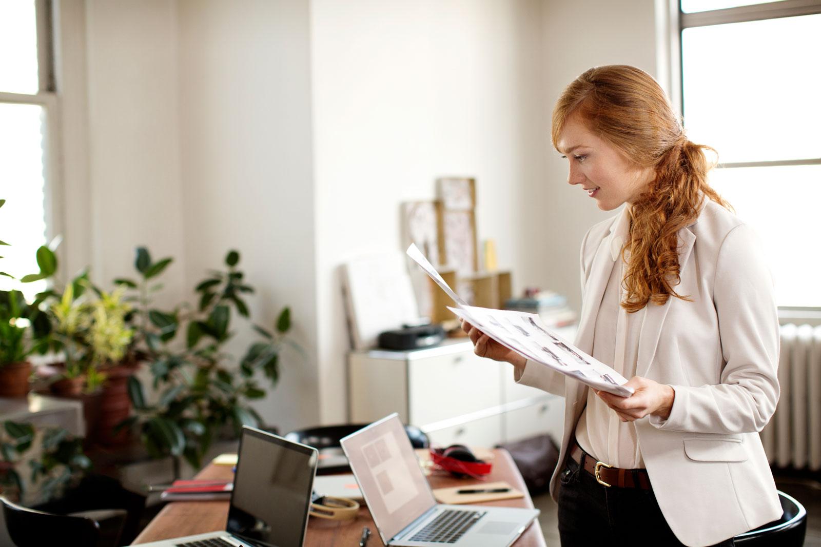 Woman looking at papers
