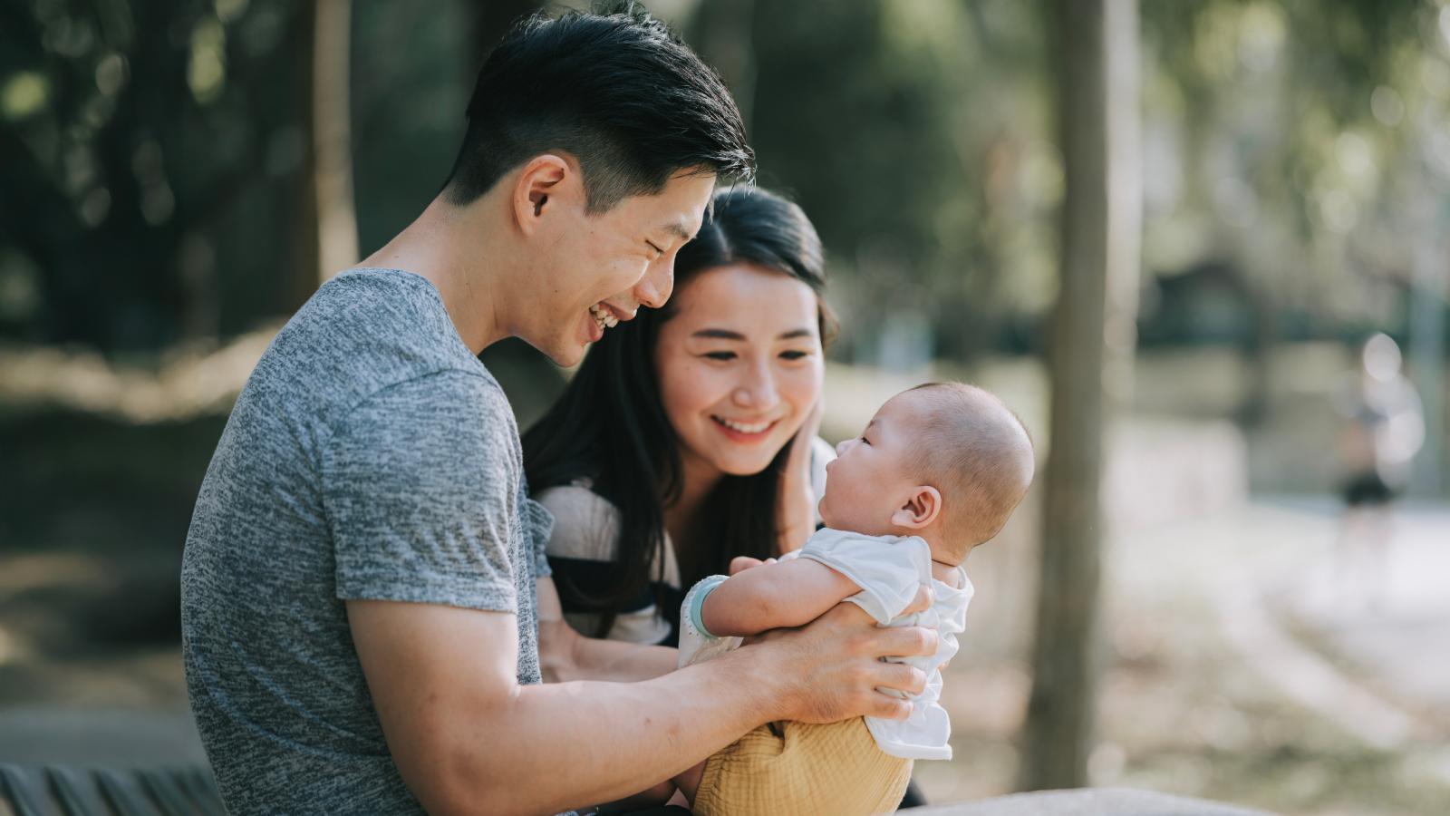 Parents bonding with their baby