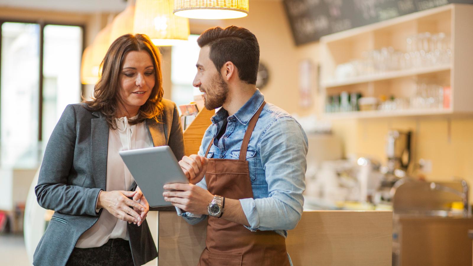 People looking at tablet