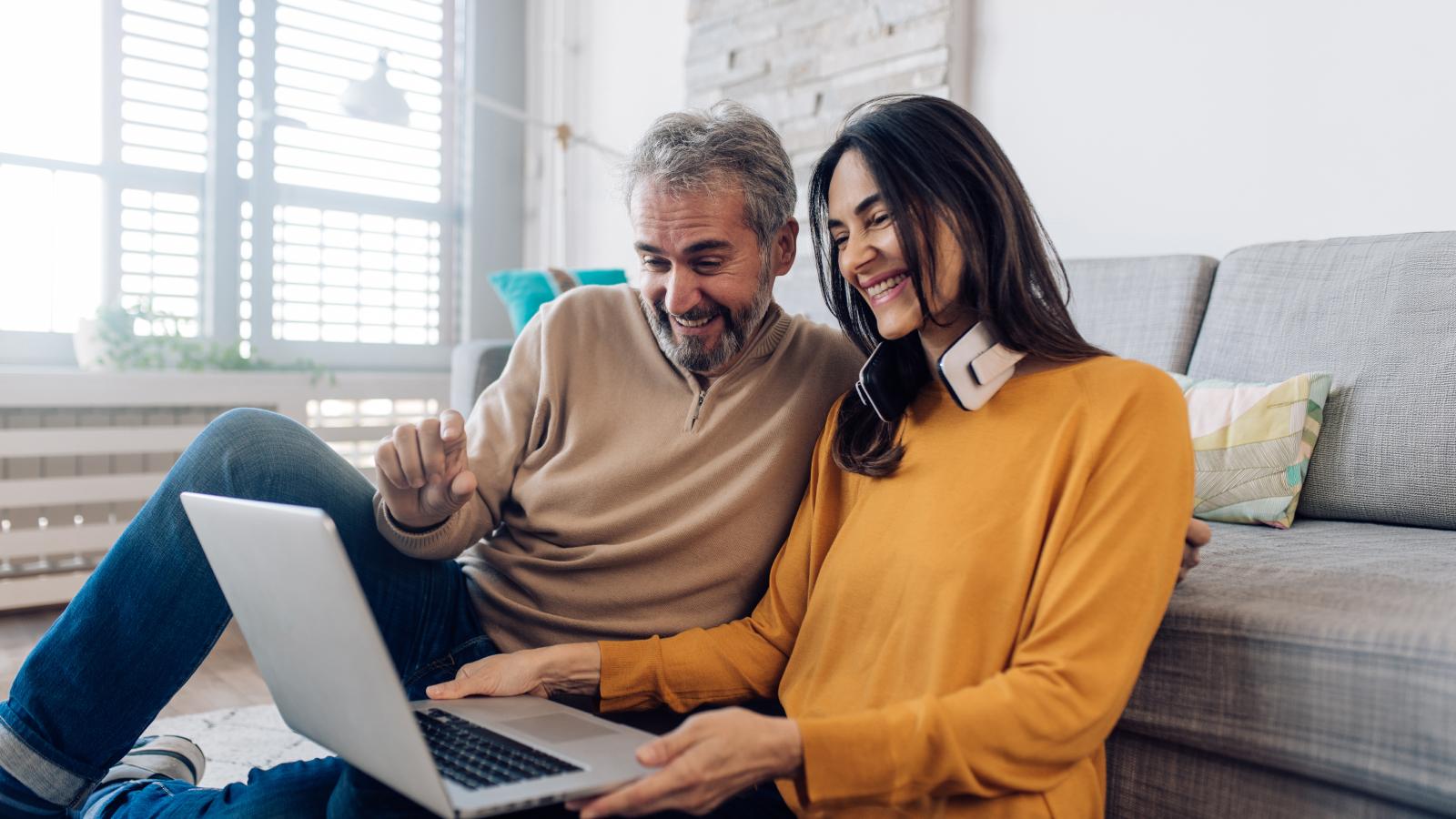 Couple working online from their house