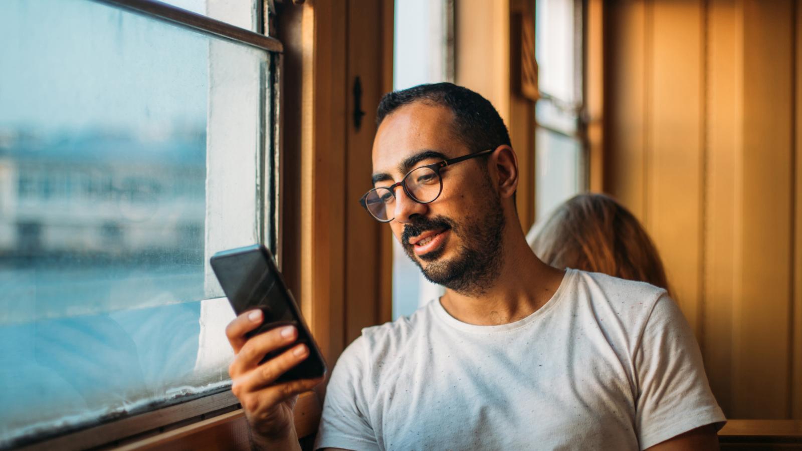 Man looking at his cellphone