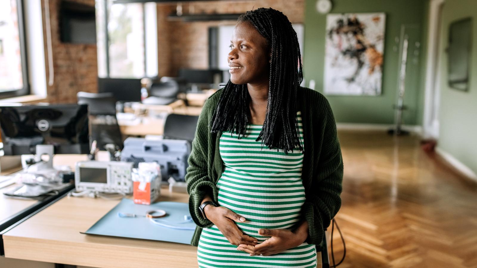 Pregnant woman in the office