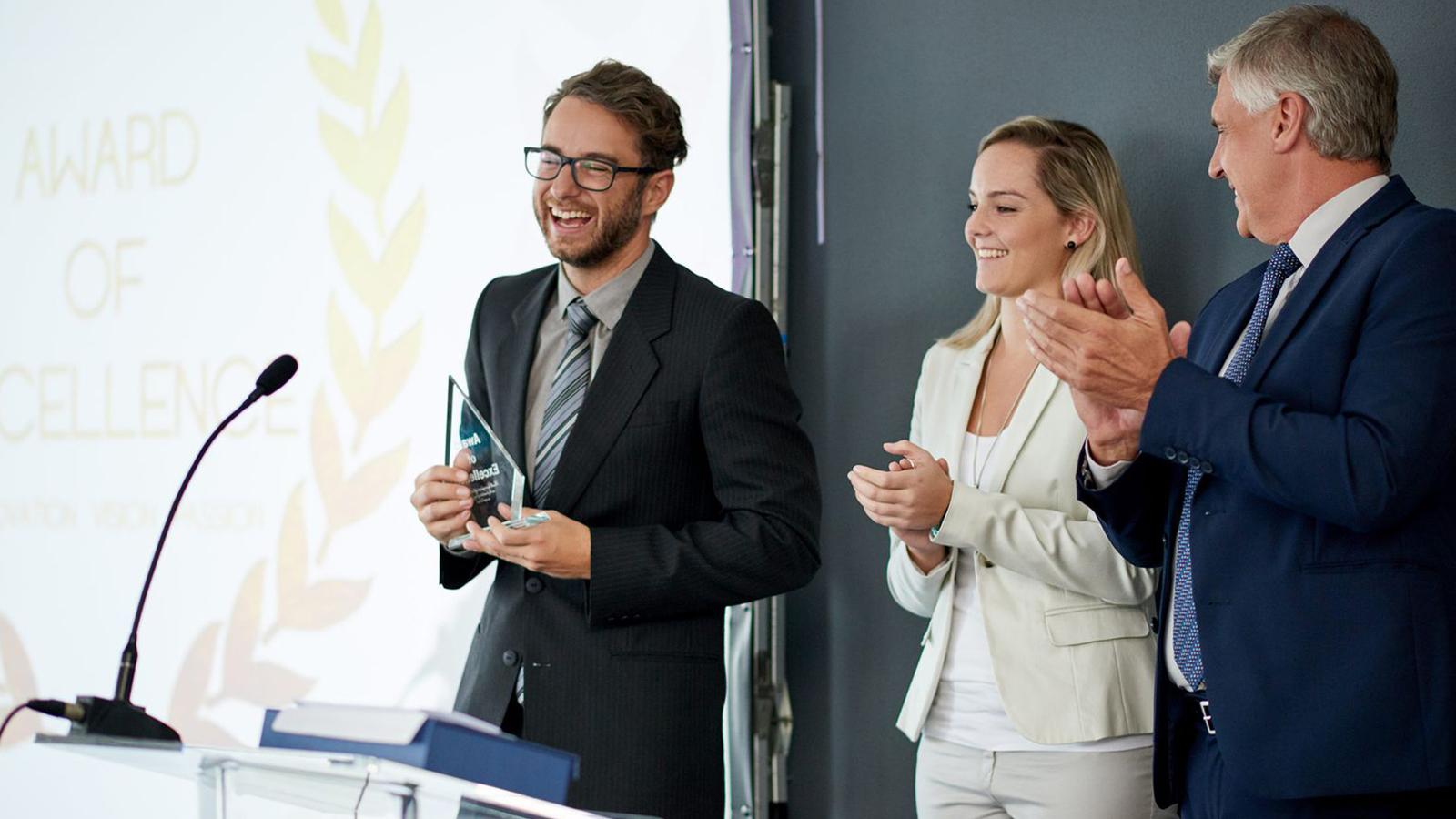 Man receiving an award
