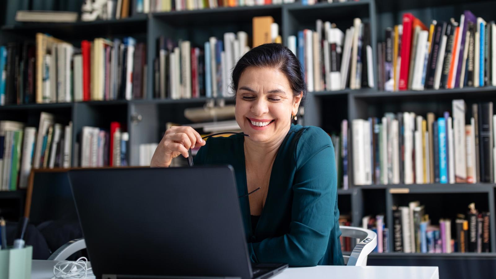 businesswoman looking at her laptop