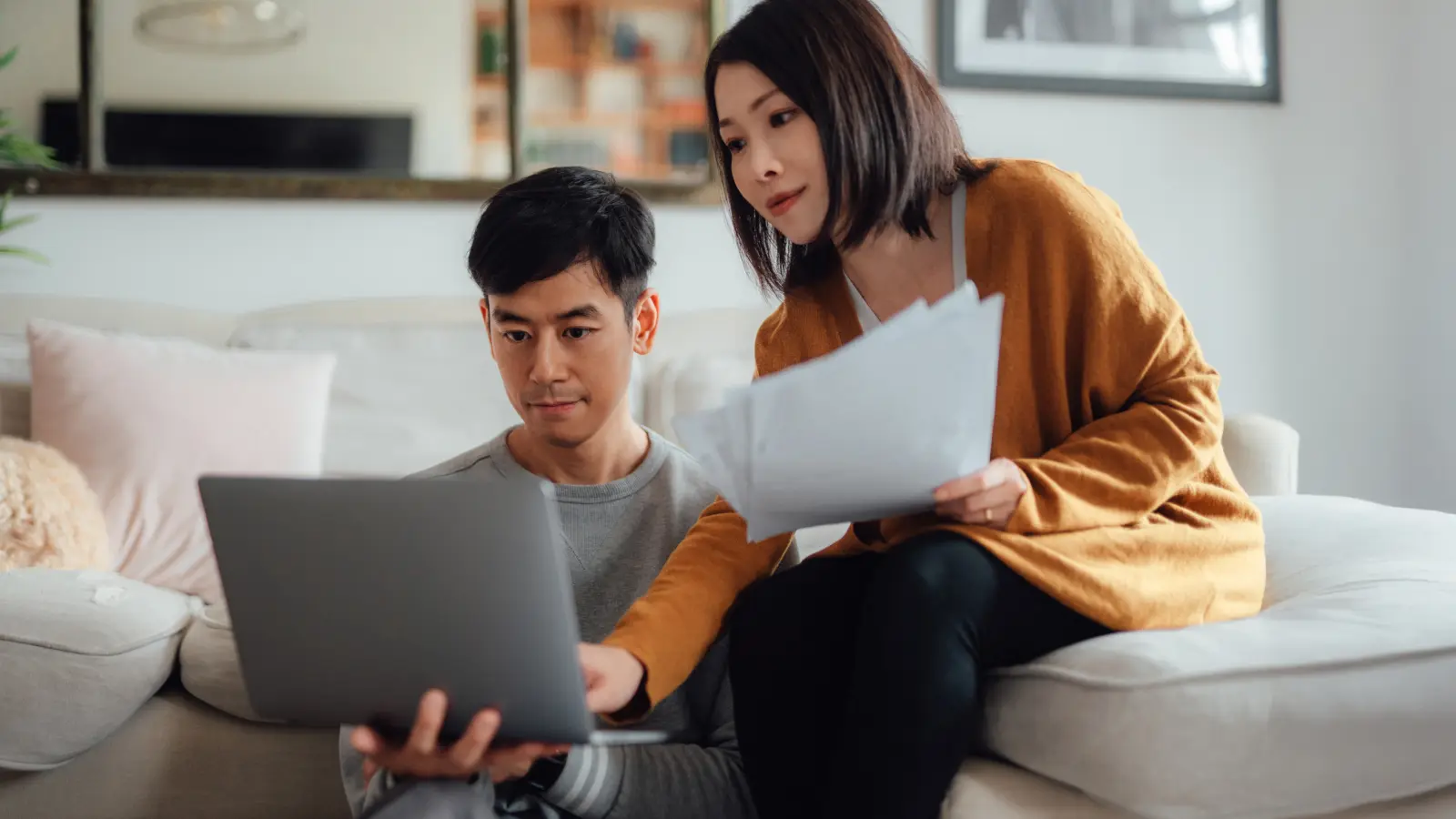 Couple discussing over financial bills