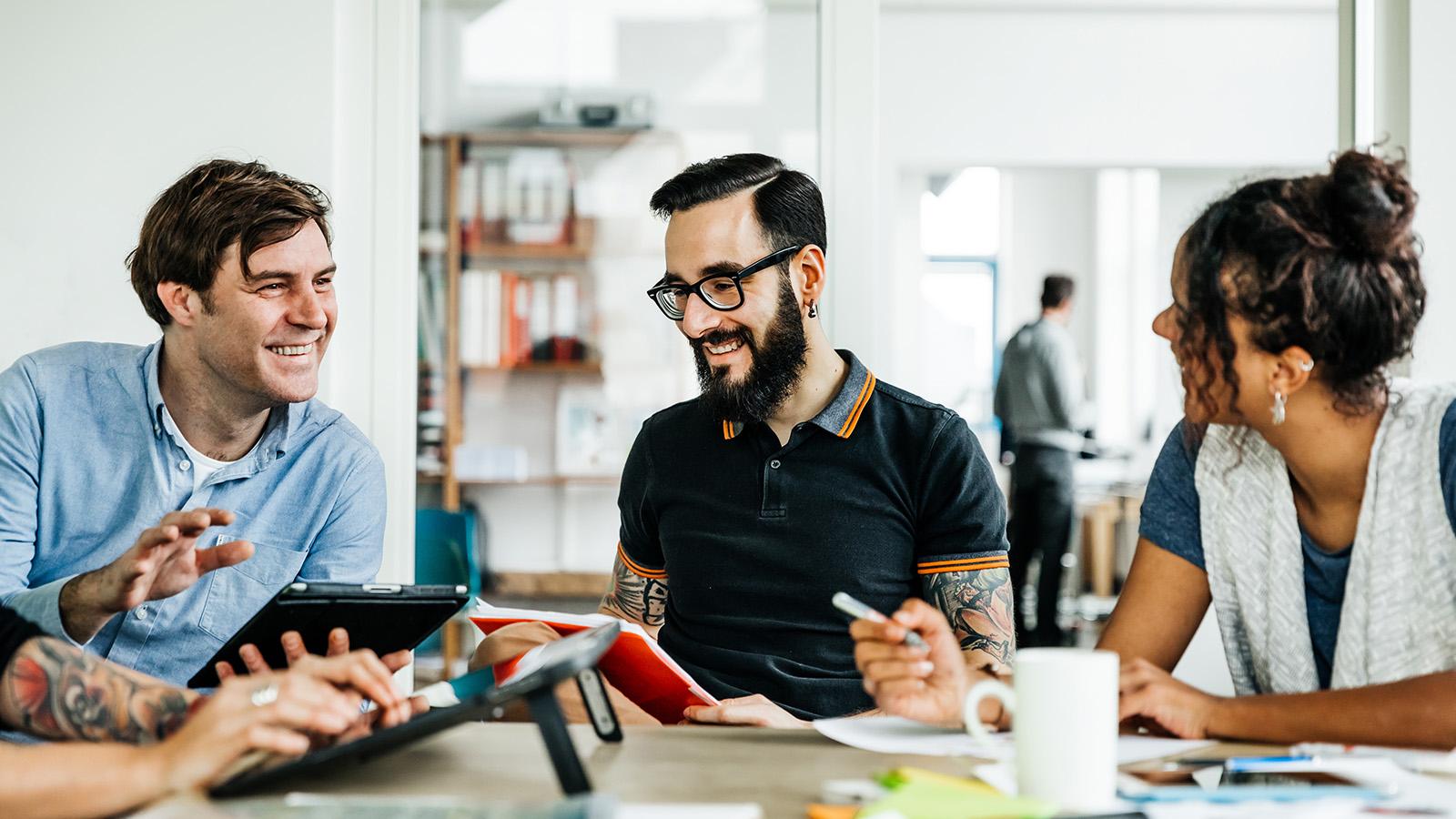 Colleagues collaborating during a team meeting