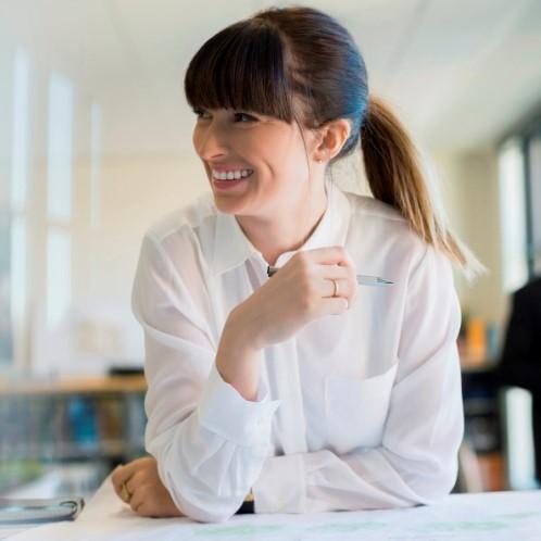 Woman smiling at work.