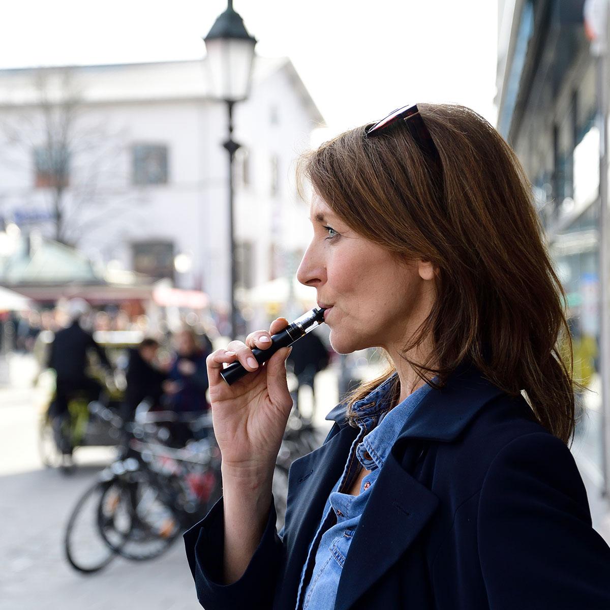 Woman using a vape