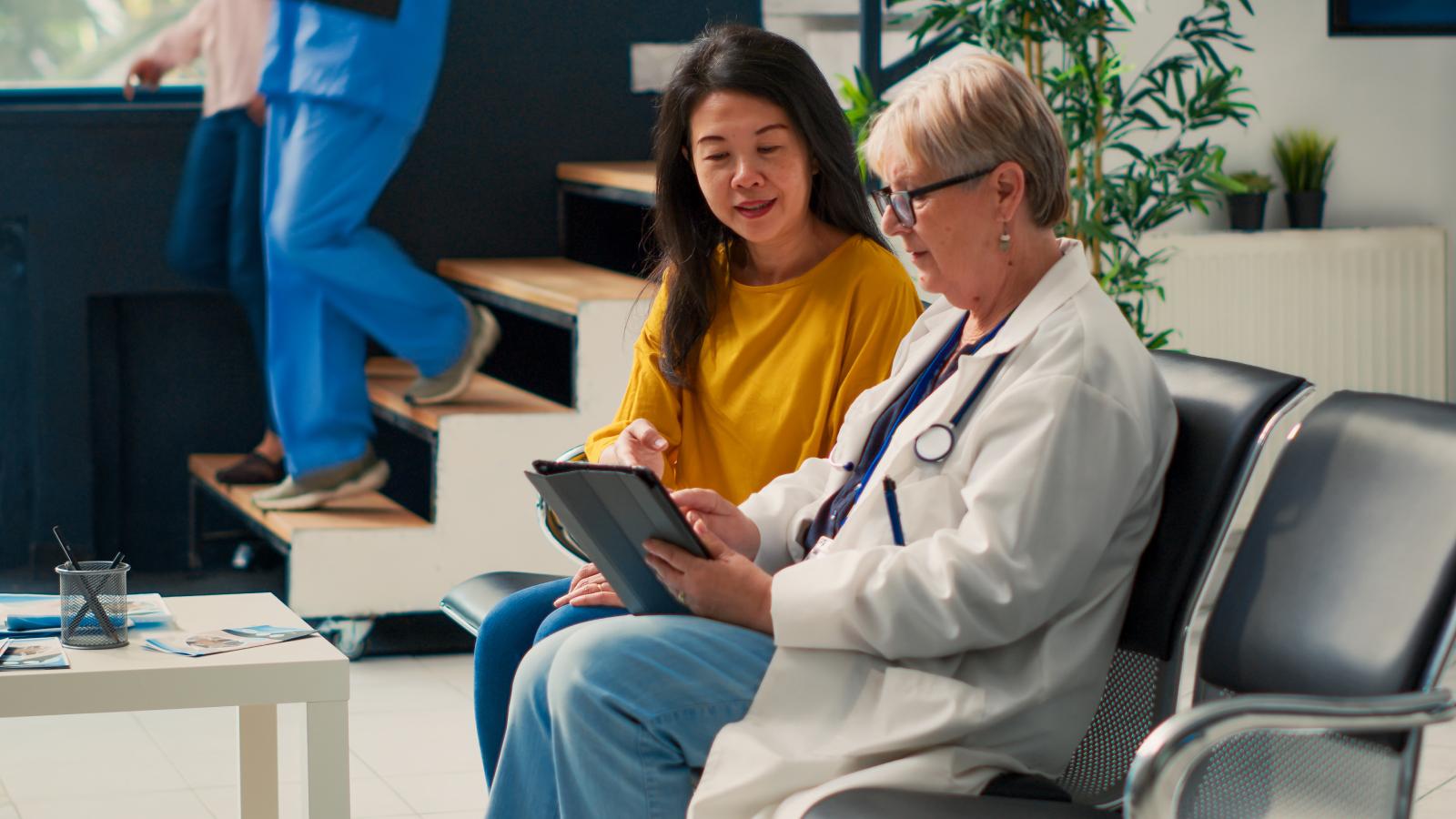 Women analyzing checkup report
