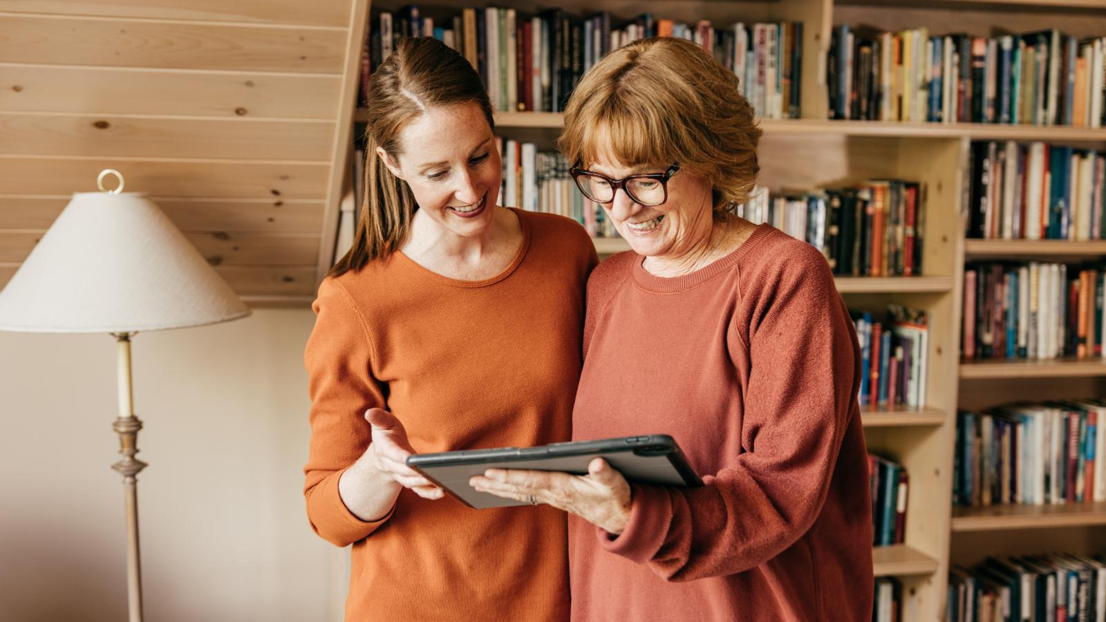 Mother and daughter watching tablet