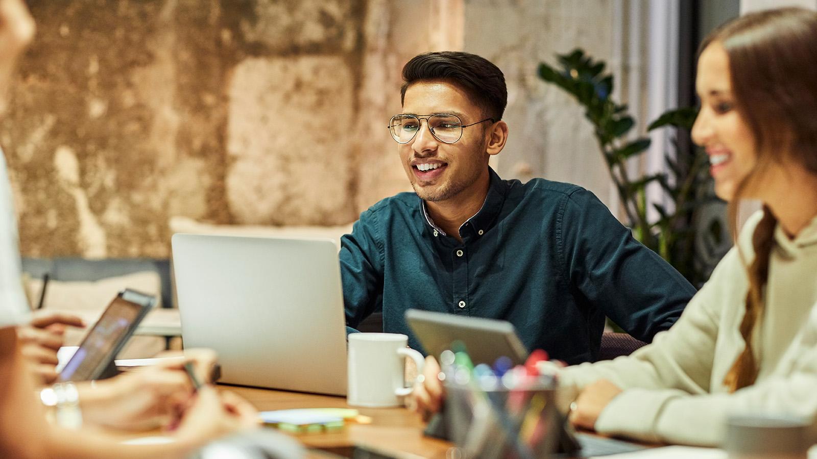 Young employee in a meeting at work.