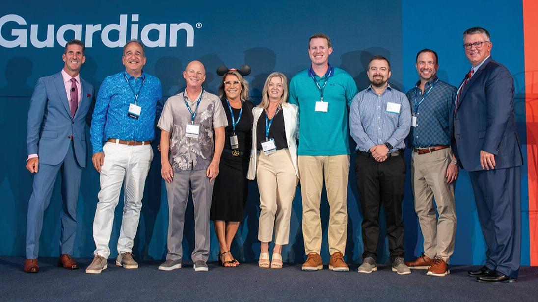 2030361024 - 0085 David Blake (Insmed Insurance Agency), Eric Tiedtke (Tiedtke Marketing Group), Cathy Konner, Sandra Scolari, Michael Fitzpatrick, David Bowman, Shawn Johnson (Treloar & Heisel, Inc.), joined by Kevin DeGray on the left and Ed Youmell on the right