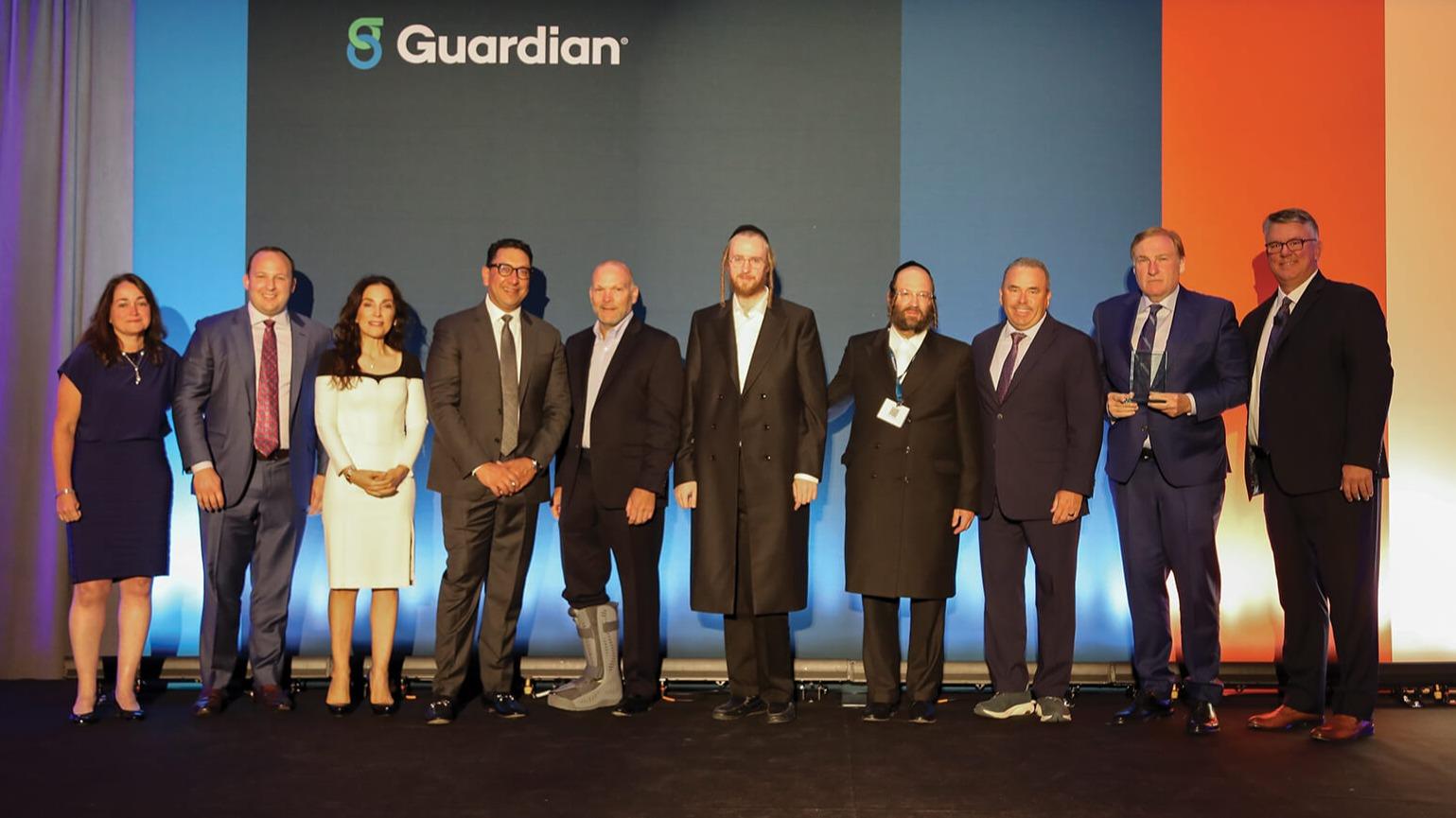 Left to right: Leyla Lesina, Ken Alter, Michele Lee Fine, Asghar Kazim, Matt Liscomb, Elie Engel, Wolf Perl, Paul Vecchione, Mark Murphy, Ed Youmell