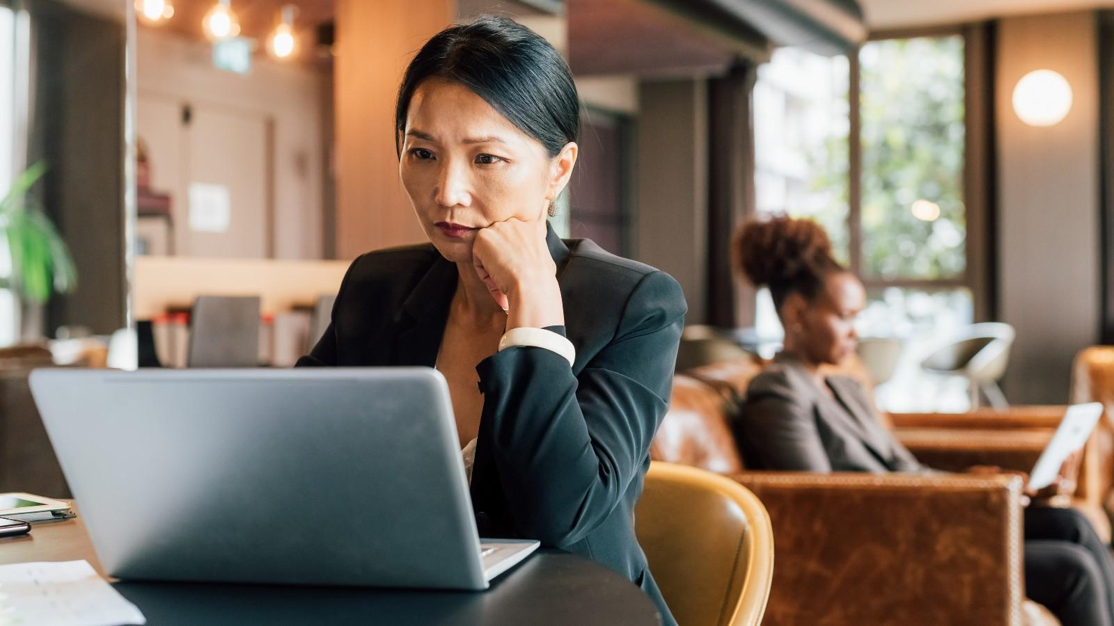 employee staring at the laptop screen
