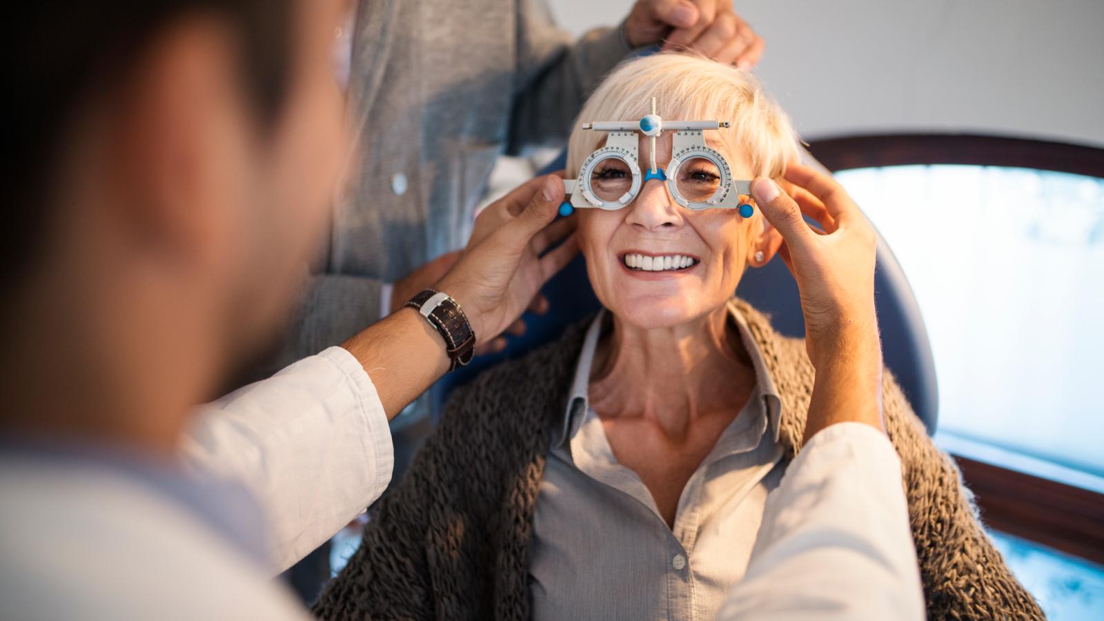 Retired woman getting an eye test at the ophthalmologist. Retired woman getting an eye test at the opthamologist.