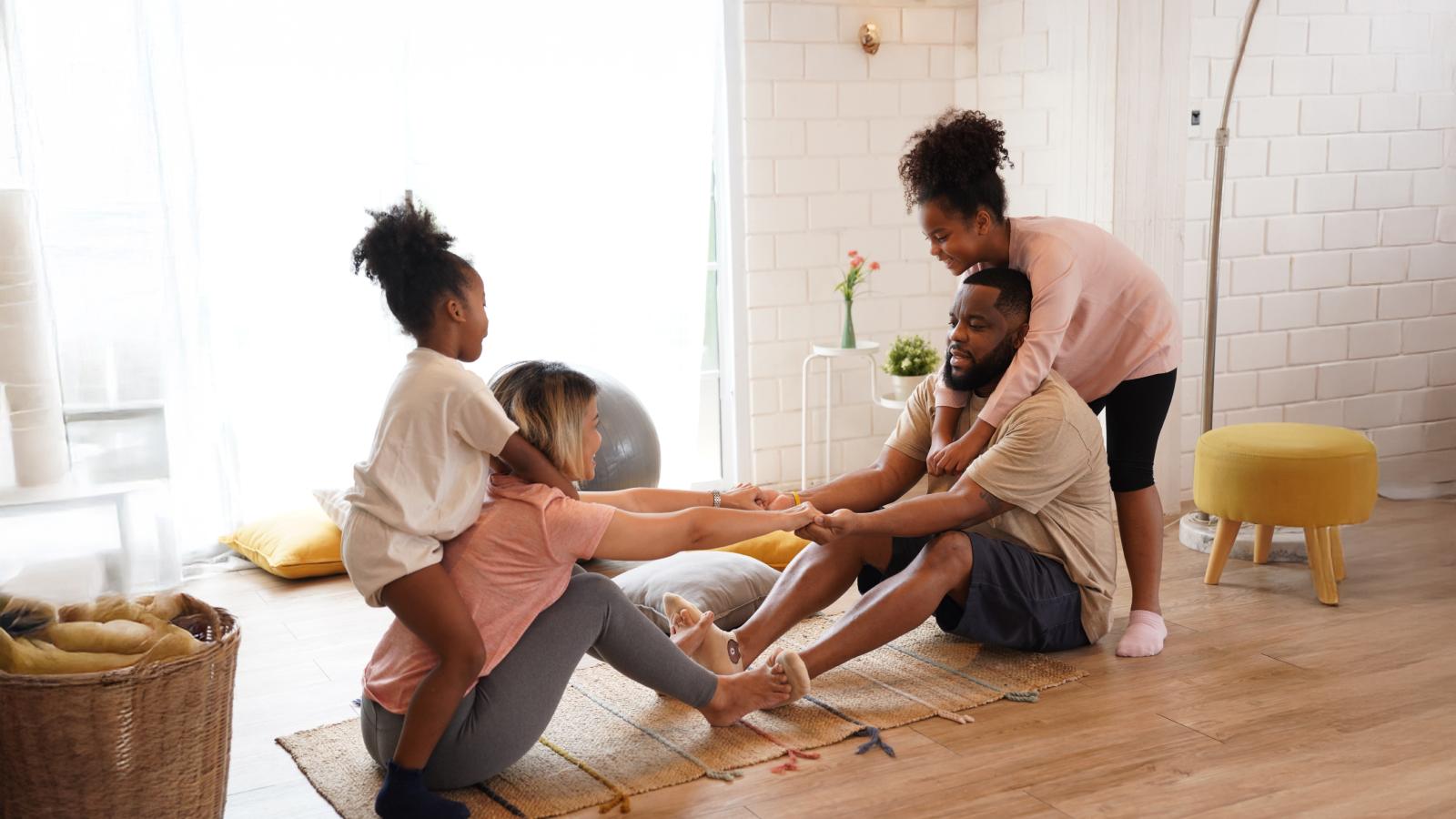 Family exercising together caring and relationship