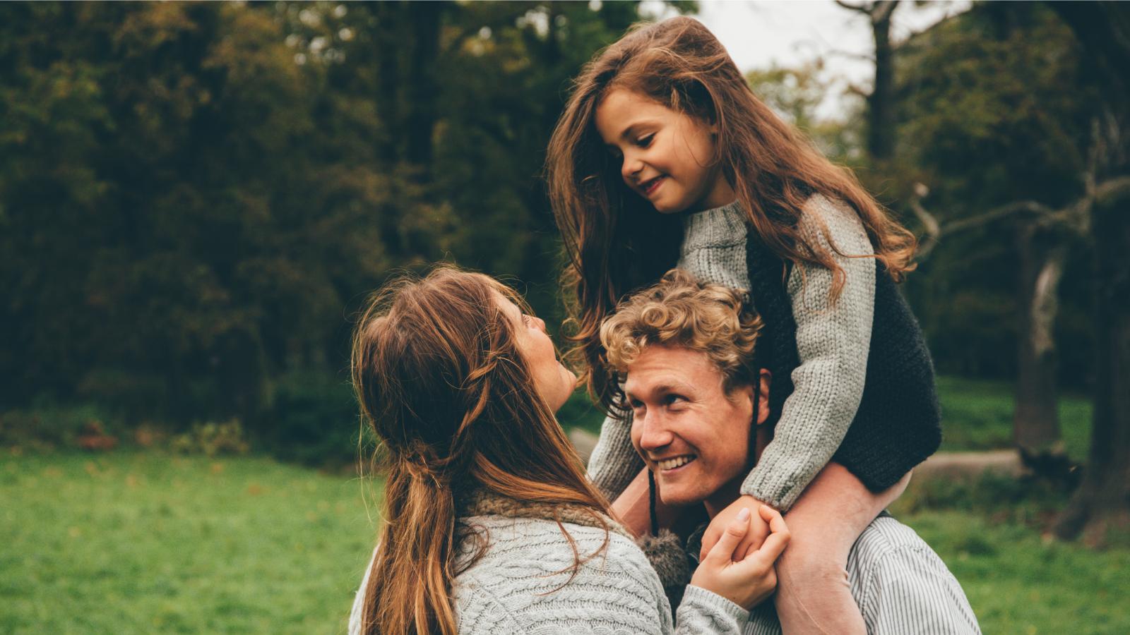 Joyful parents with daughter