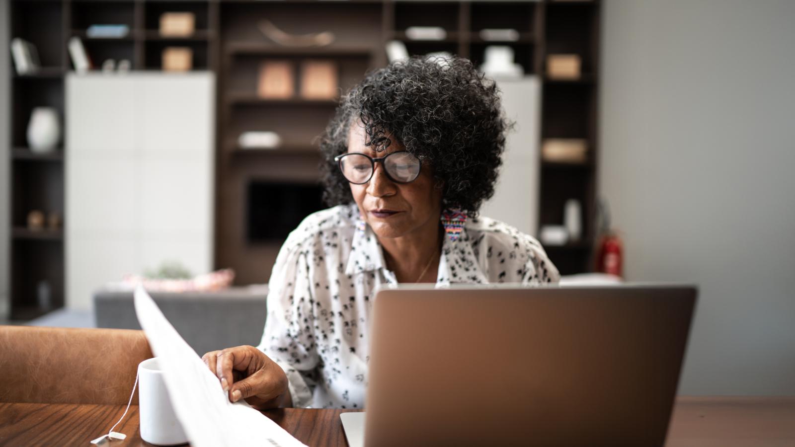 Senior woman working from home