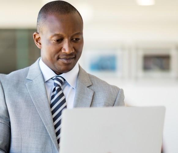 Man on laptop.
