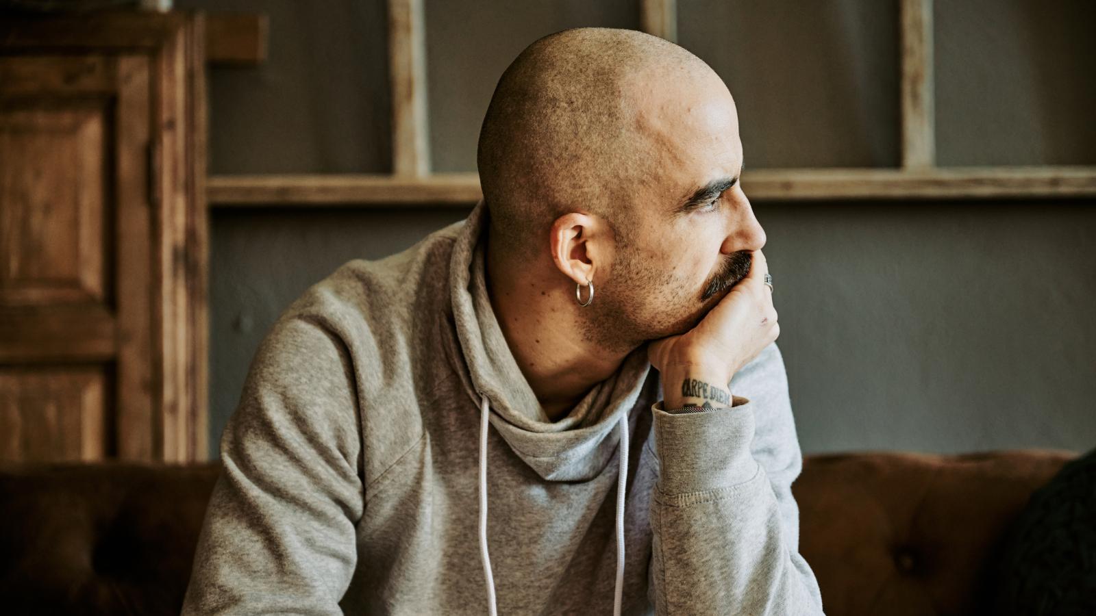 Man with cancer looking pensively. Man with cancer looking pensively.