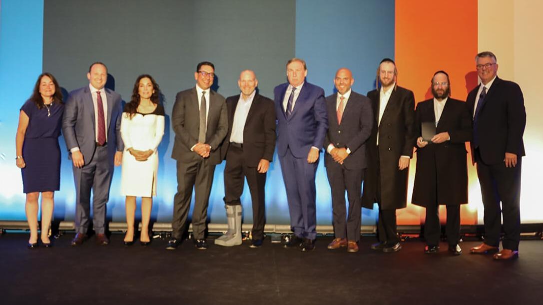 Left to right: Leyla Lesina, Ken Alter, Michele Lee Fine, Asghar Kazim, Matt Liscomb, Mark Murphy, Joe Biondolillo, Elie Engel, Wolf Perl, Ed Youmell