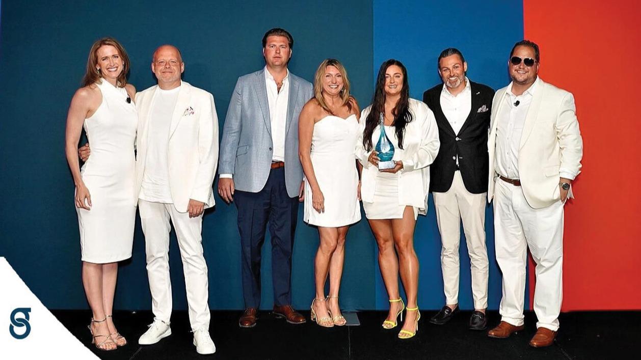 FSM24-PCA-PLQ-img Michael Fraiman, Ian McGurran, Becky Thompson, Regina Reiff, Scottie Howard, joined by Meg Vecchi on the left and Keith Kronen on the right