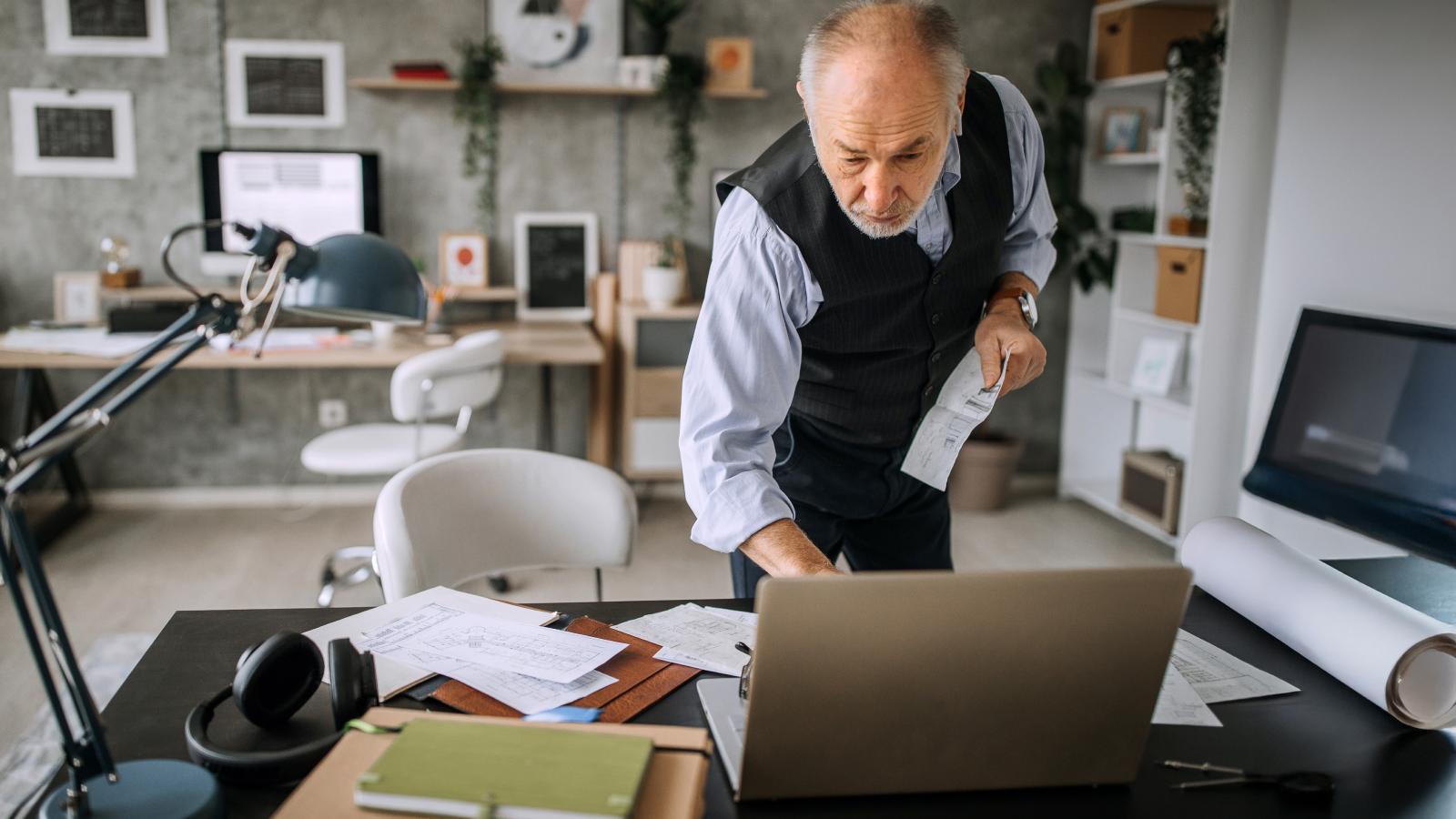 Senior architect at his office Senior architect at his office