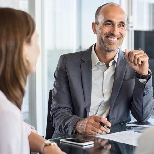 Financial professional meeting with clients.