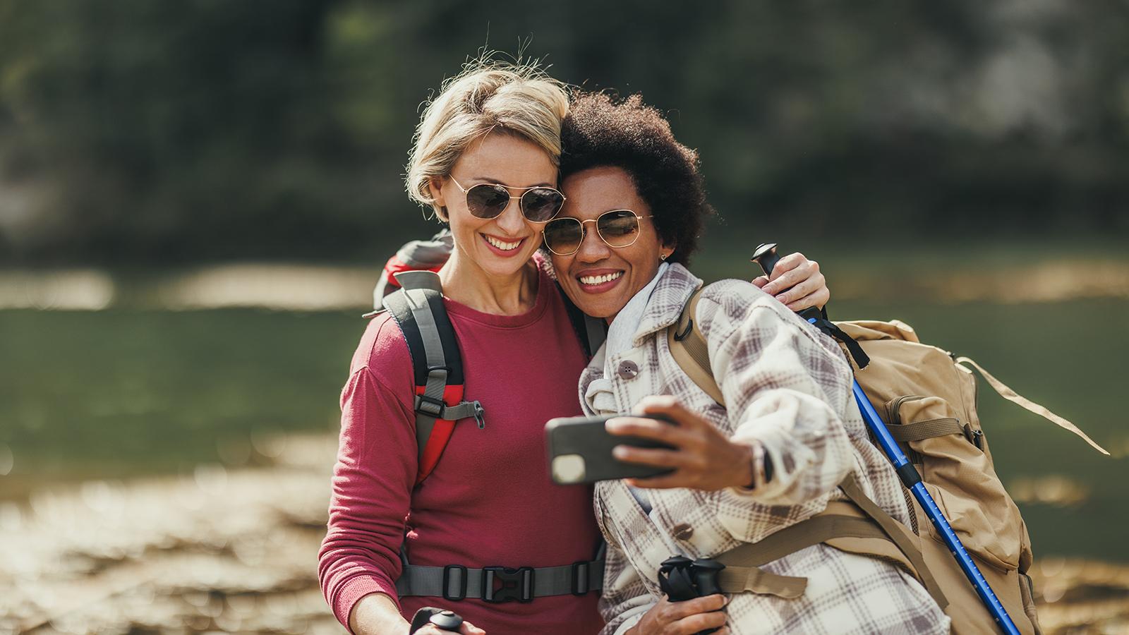 Two women taking a selfie while on a hike