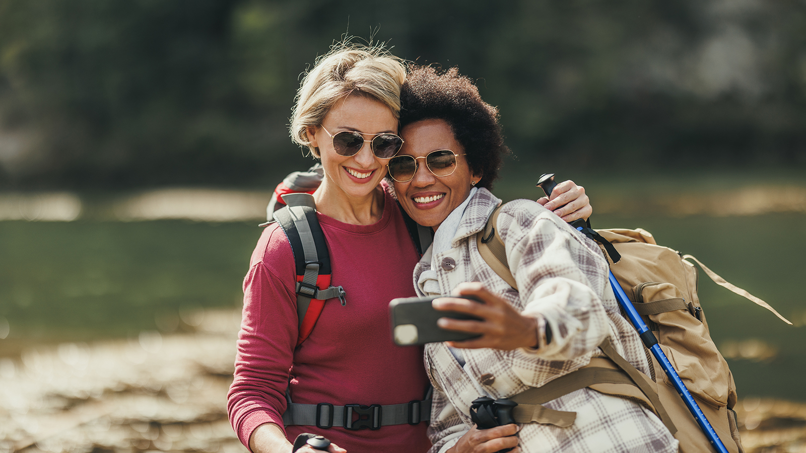 Two women taking a selfie while on a hike