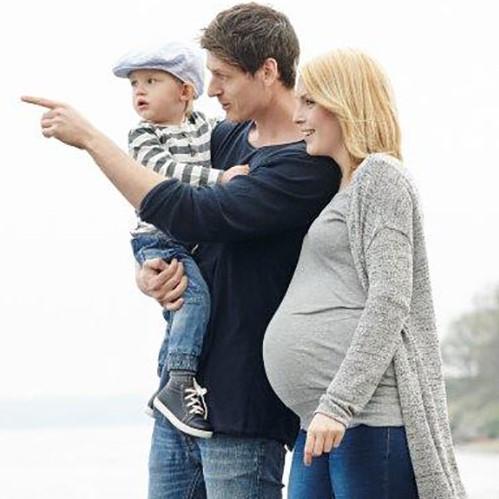 Young family at a lake.