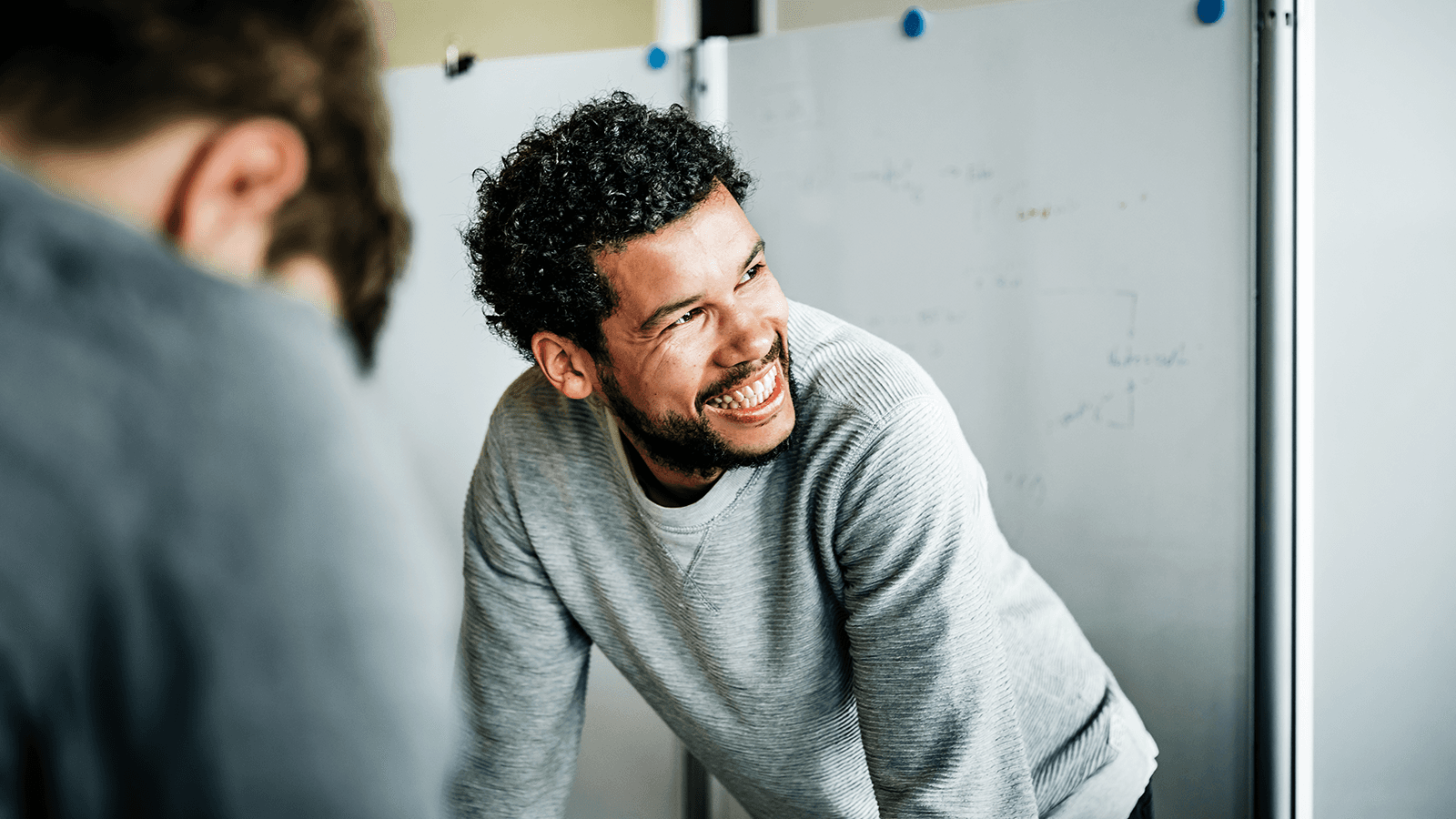 Portrait of casual businessman during meeting