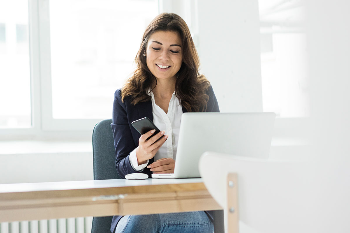 Woman on her tablet speaking to her dentist