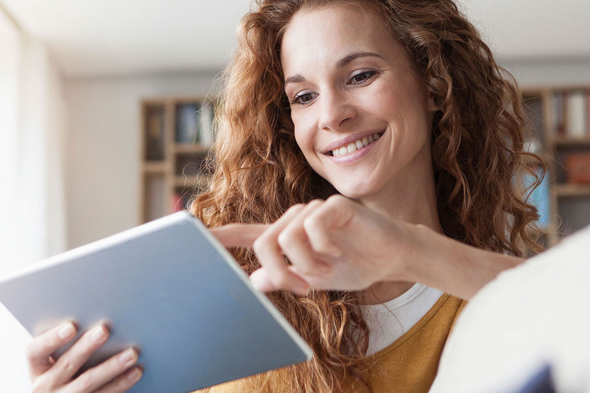 Woman on her tablet speaking to her doctor