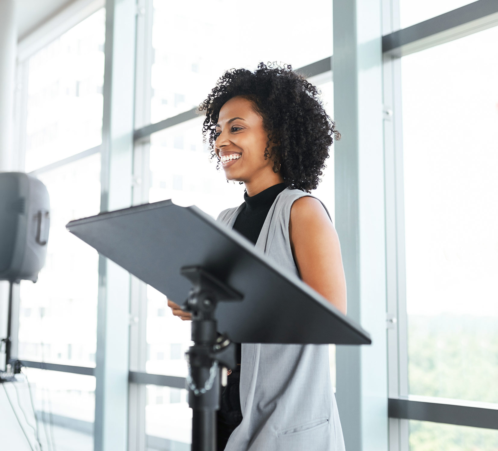 African American woman speaking at an event